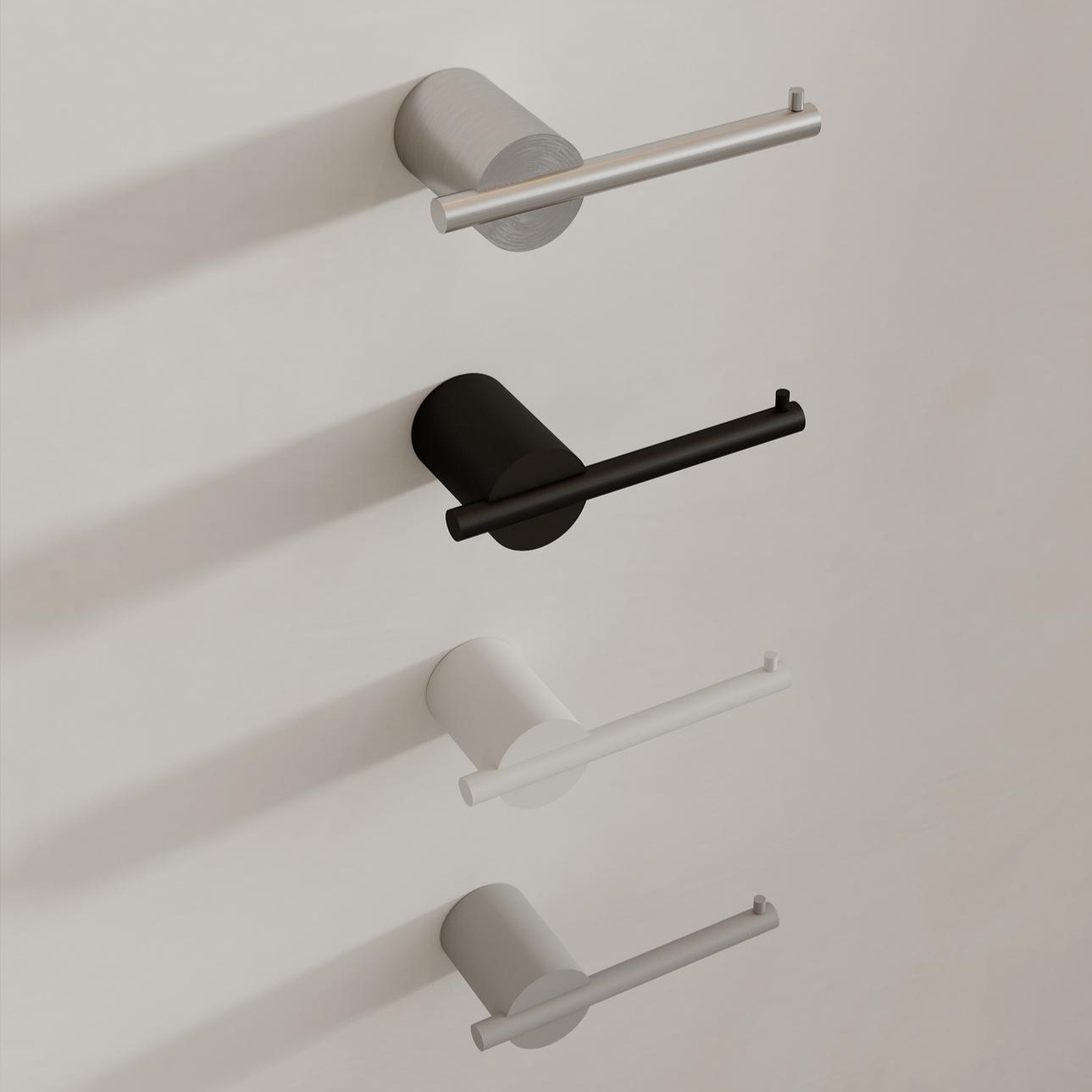 Бумагодержатель Tezza Rollo Art (нерж. сатинированная сталь), расположение бумаги слева